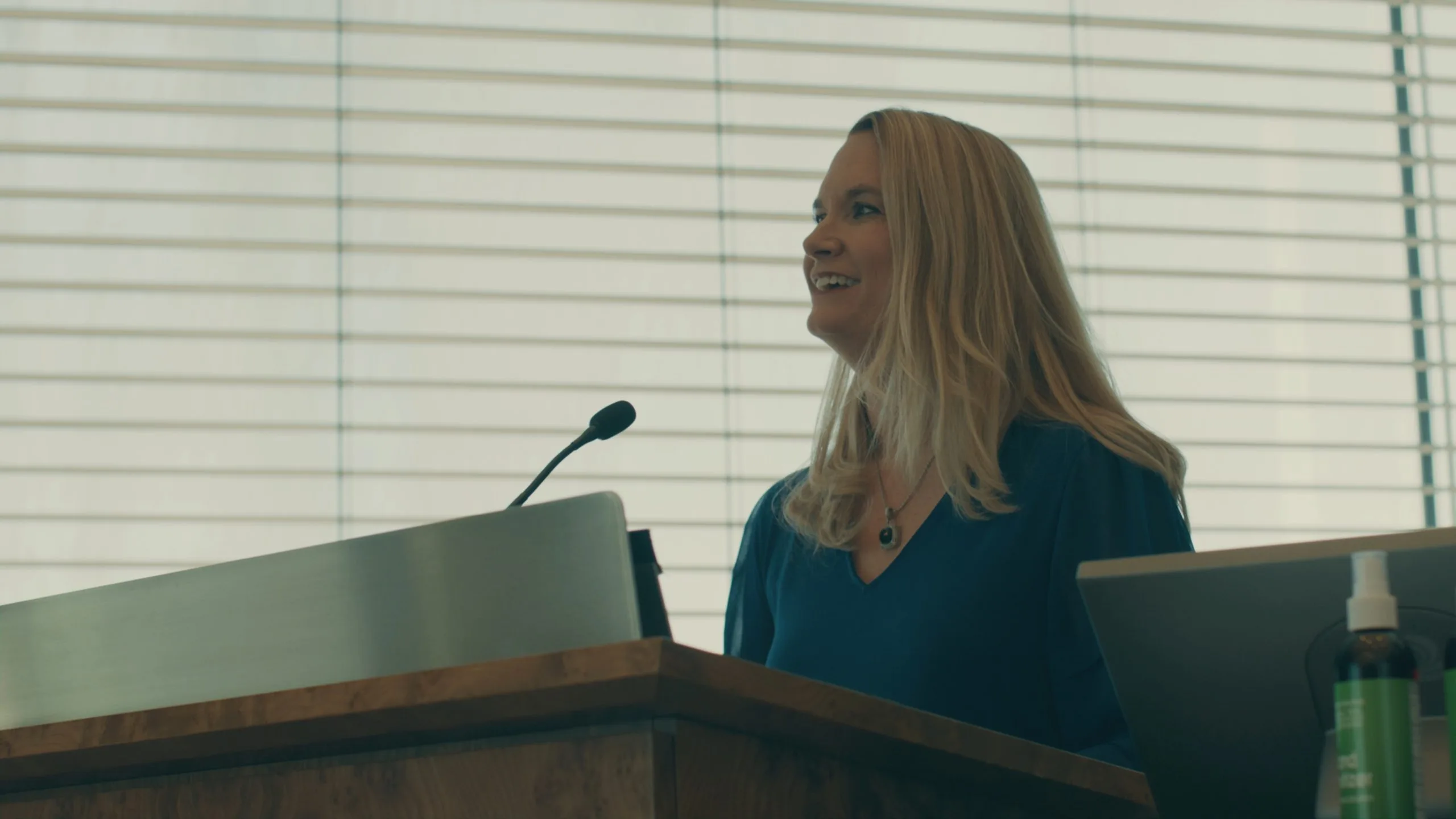 Woman at podium