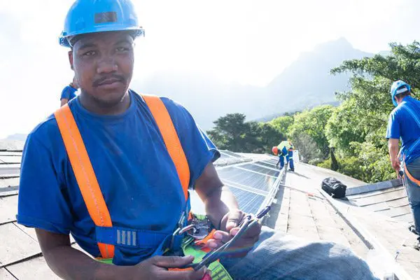 Man Installing Solar Panels