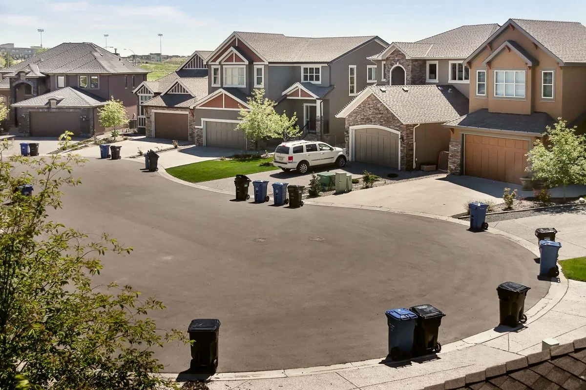 Garbage containers on the street in Residential District