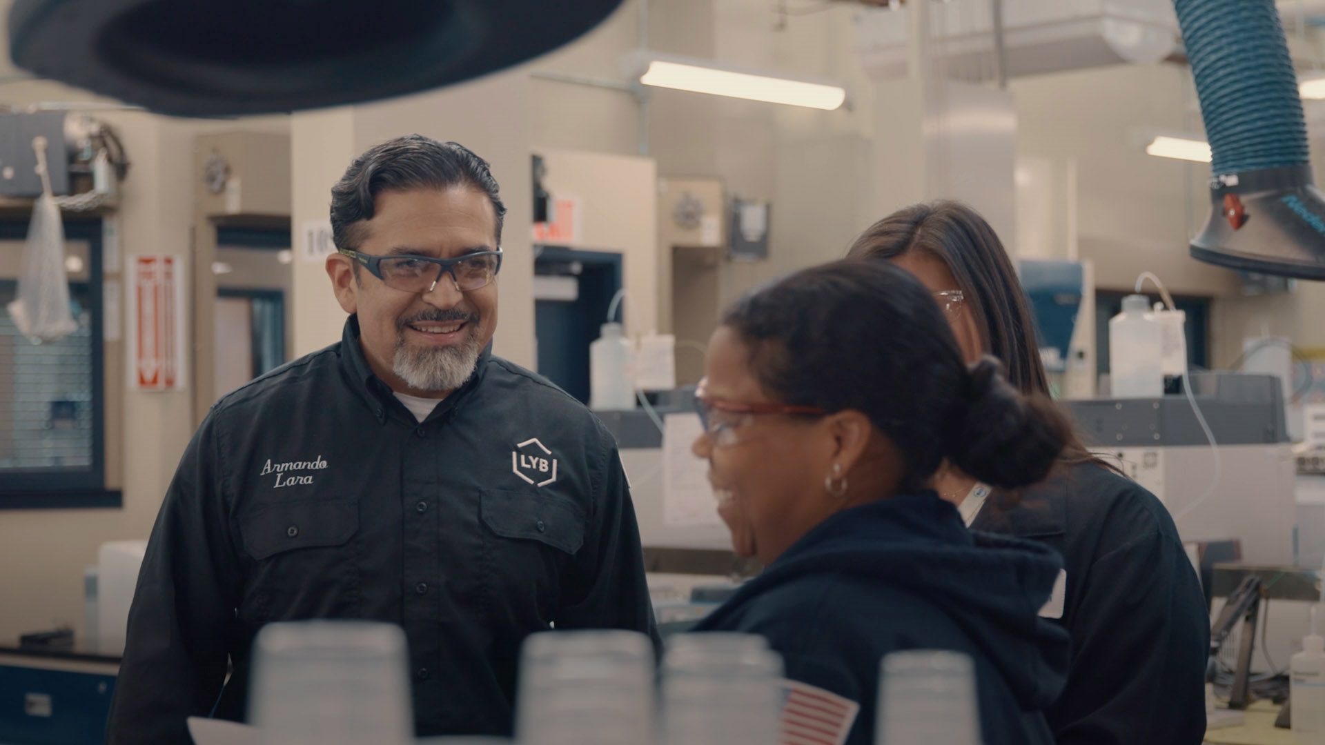 Armando from LDB smiling at a coworker