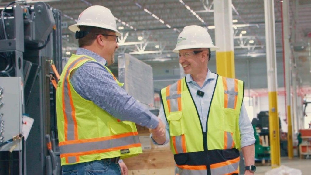 two men shaking hands