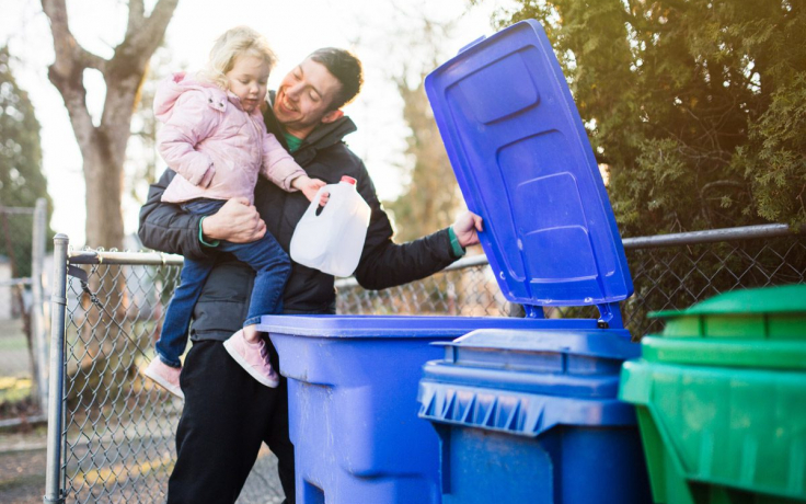 Father-and-Child-Taking-Out-Recycle-Trash_GettyImages-508960182-opt